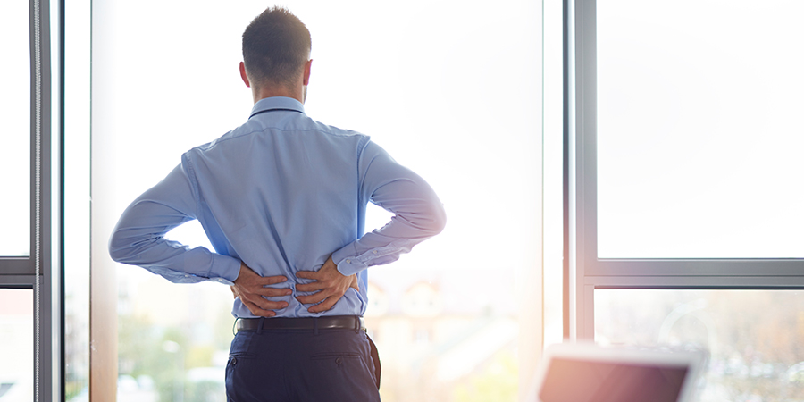 Man suffering from back pain