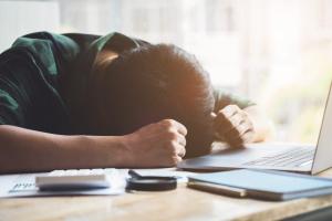 Stressed man experiencing burnout