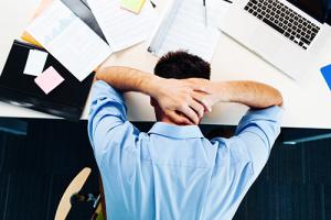 Man experiencing stress at work