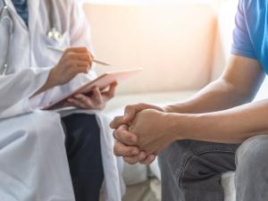 Man talking to a doctor